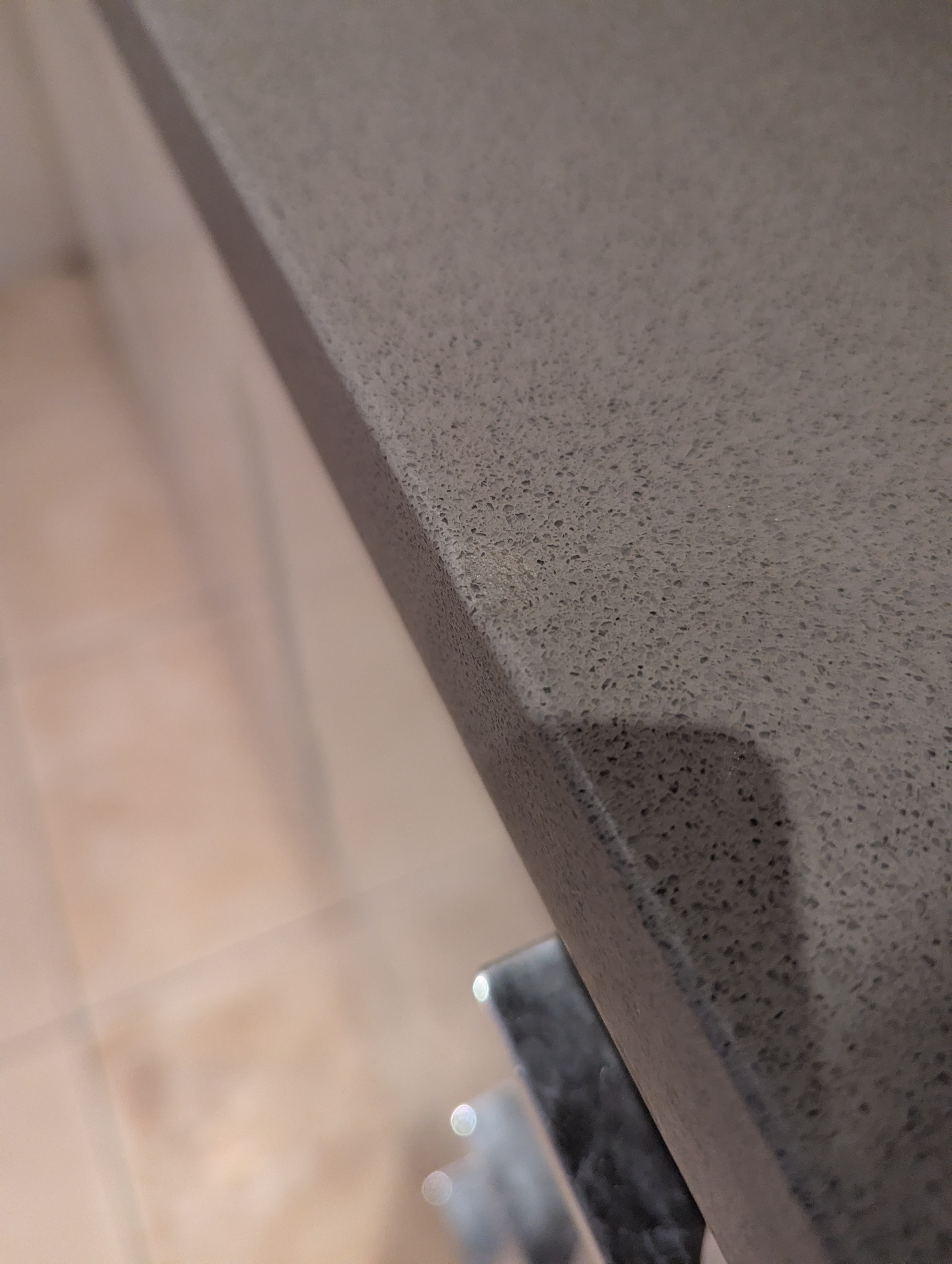 Silestone quartz chip repair · before